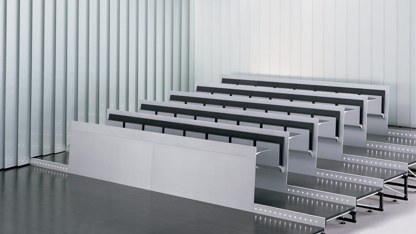 Blade System benches by Lamm installed across a tiered lecture hall