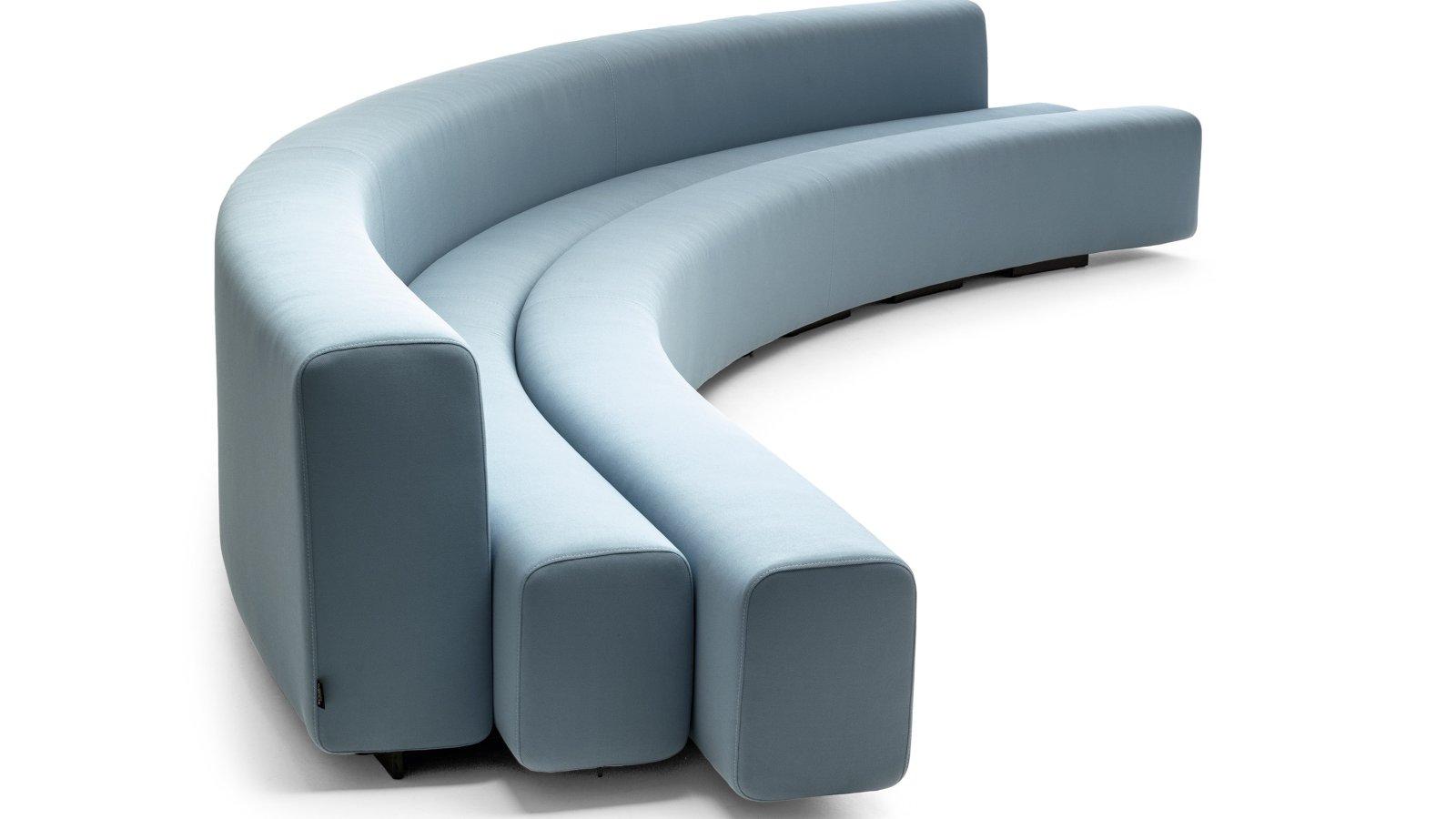 Osaka curved sofa by LaCividina assembled in place in a Mumbai corporate lobby