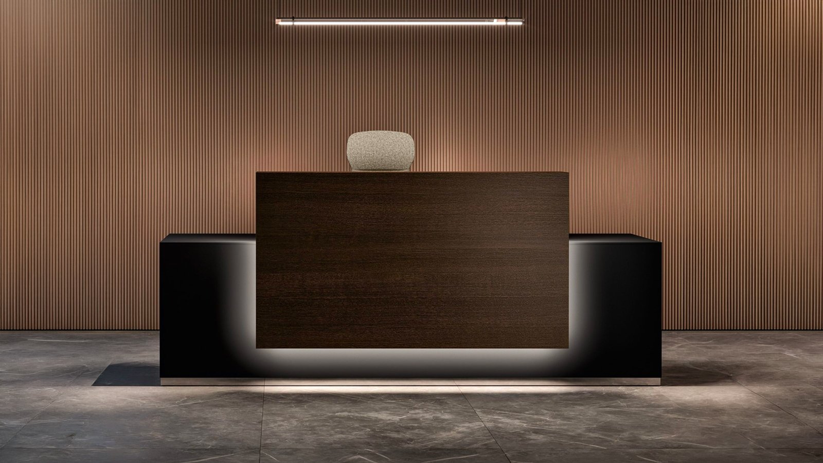 Glass-ceramic shelf of the Lux reception counter by Bralco