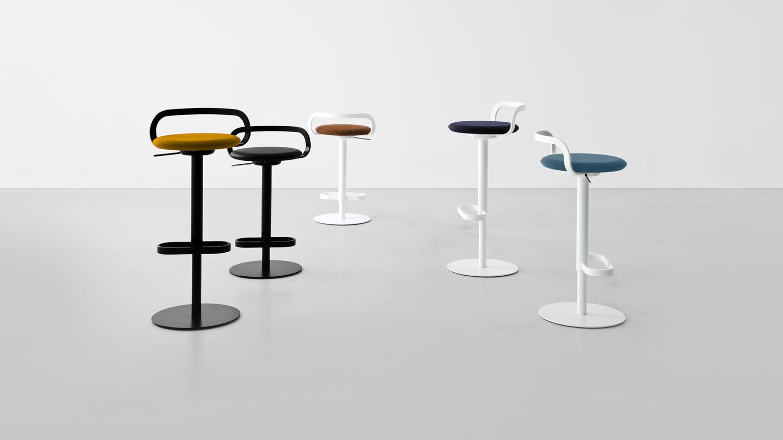 MAK bar stools by Lapalma in a large office cafeteria
