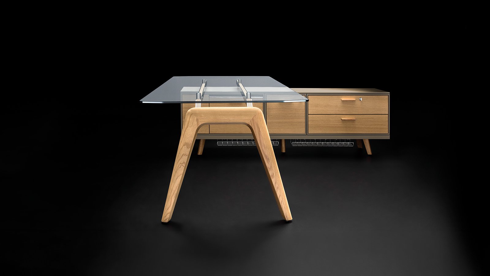 Rail executive desk by Bralco with tempered glass top and integrated wooden shelf