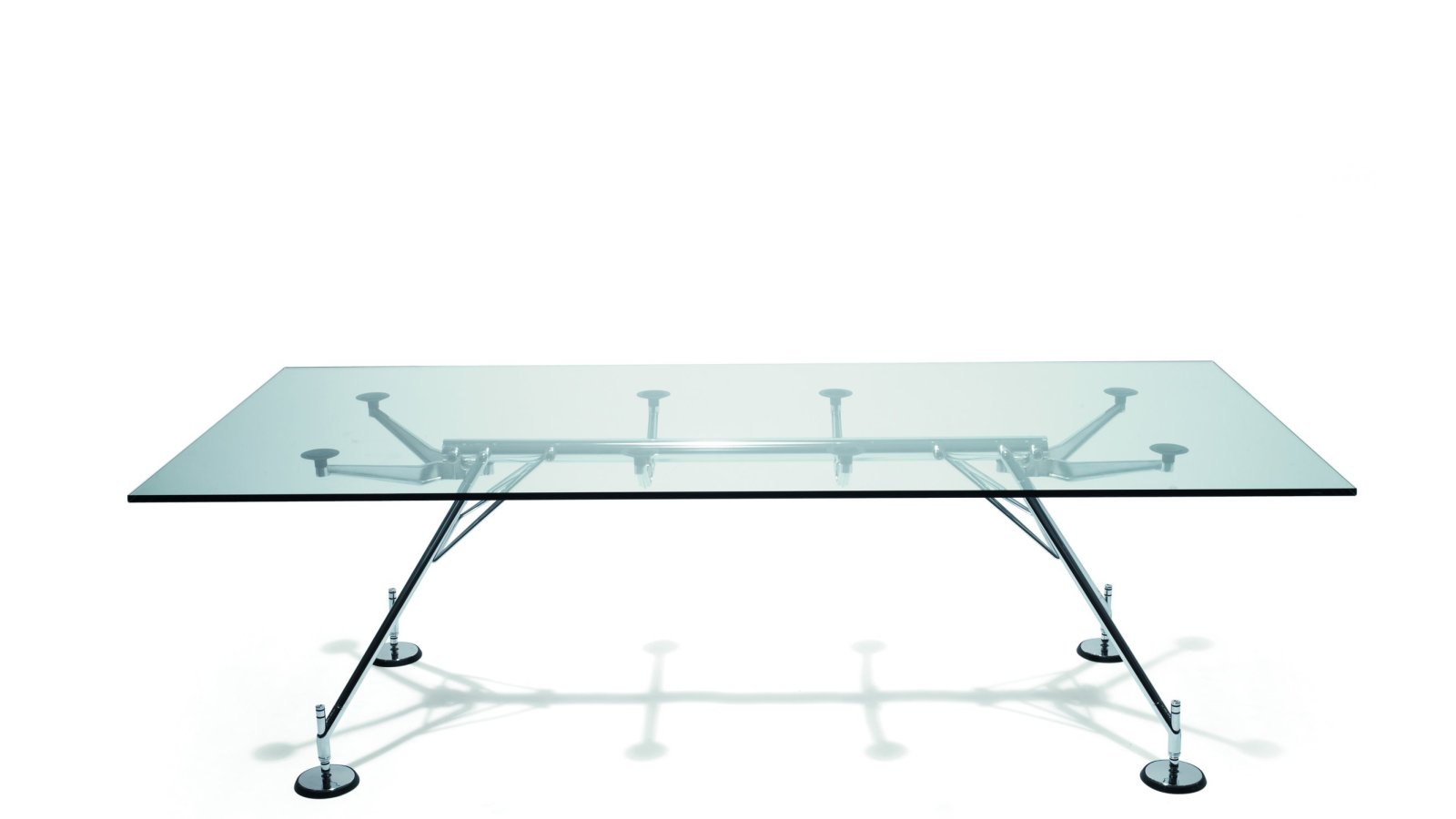 Nomos desk system by Tecno extended along one tubular backbone