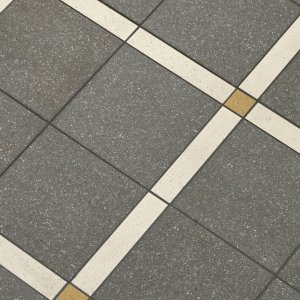 Dover White Rough tile from the Time collection with mineral grain