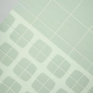 Betty porcelain floor with plain and graphic tiles