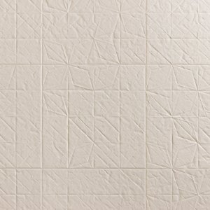 Folded porcelain surface by Mutina with paper-fold relief