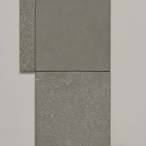 Pool surround paved in Time Rough porcelain