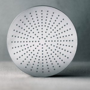 Floor-mounted AL/23 basin mixer by Fantini near a freestanding wash basin