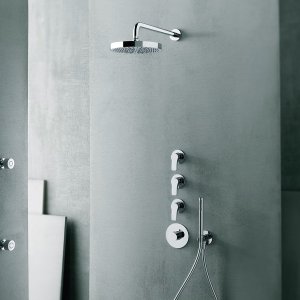 Chrome AL/23 three-hole basin mixer by Fantini with a pair of handles