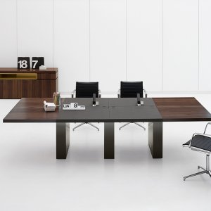 Walnut Ar.tu desk resting on its service unit