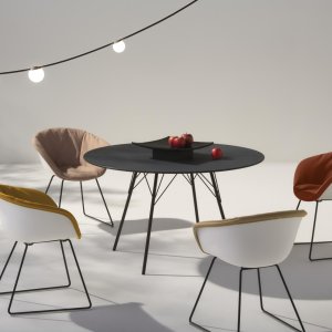 Stacked Leaf chairs by Arper in a restaurant