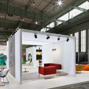 Leaf design chairs around a Compact HPL table by Arper