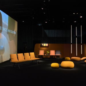 Upholstered modules on a Pausit bench in a hotel lobby