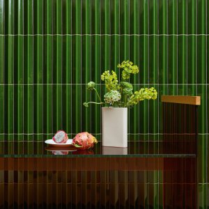 Compact reception wall with dense Rombini Extra Small relief by Mutina