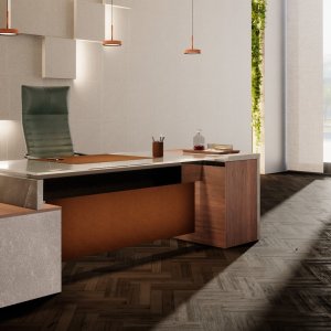 Mirror-polished stainless steel crossbar under the glass top of a One desk