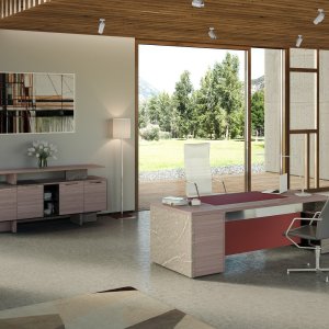 Piasentina stone side of a One executive desk with natural white veining