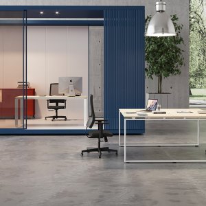 Loft office tables in a corporate floor
