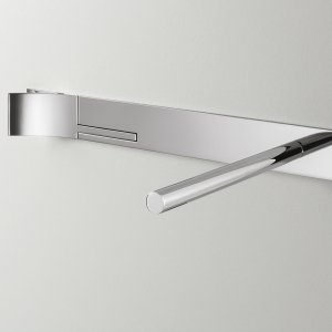 Detail view of the Cut Plus wall-mounted tap in polished steel
