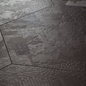 Déchirer porcelain floor by Mutina with concrete-effect bas-relief