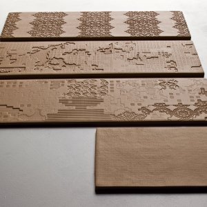 Washroom clad in Bas-Relief by Patricia Urquiola