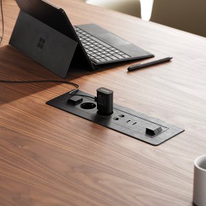 Round DR meeting table by Frezza in a corporate boardroom