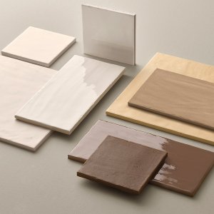 Clay Matt Figure tiles on a floor, Mutina Faces & Figures