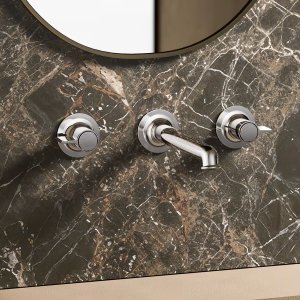 Fantini Flora sink mixer in a kitchen, with swivelling spout and hand spray
