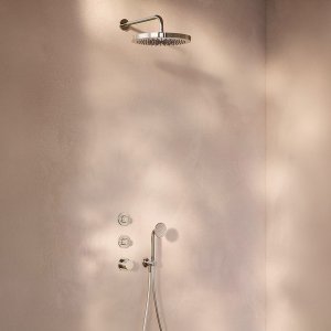 Hand shower of the Fantini Flora series hanging on its holder