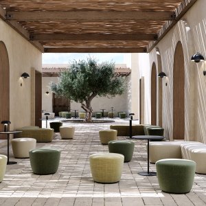 Radar Lounge armchair with a high headrest