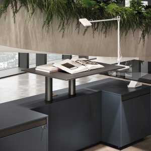 Smoked glass extensions of the Spike meeting table