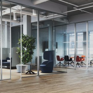 Frezza K42 partition with a tall swing door in an Indian office