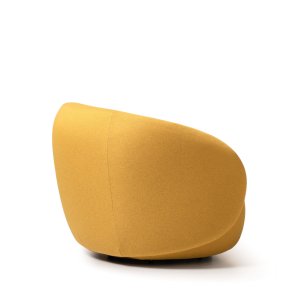Writing table with a round wooden top beside a Hill armchair