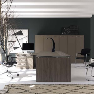 Built-in Primofiore leather-look pad framed in aluminium on the Athos elm top