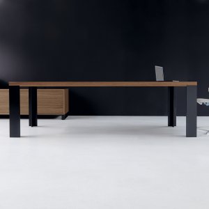 New Loop desk with walnut veneer top in a director cabin
