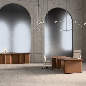 Curved shoulders with storage on the Jazz Duke desk by Mascheroni