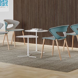 Rows of Kicca chairs linked with the KC19 cover in a conference hall