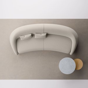 Apper sofa back, kept low, flowing into the arm at one end