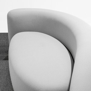 Bi-elastic fabric stretched smooth across a Lisse ottoman, detail