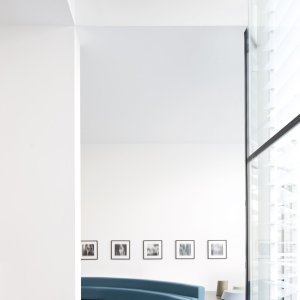 Steel base of Osaka painted black RAL 9005 on a marble floor
