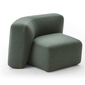 Suiseki armchair with a side table in a lounge