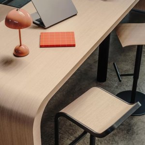 Curved hollow-core wooden top of Brunch by Lapalma