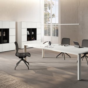 Iulio monolithic wall units with push-open doors and reversible bookshelf