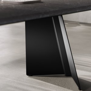 Monolith coffee table with ceramic top in the cabin's meeting corner