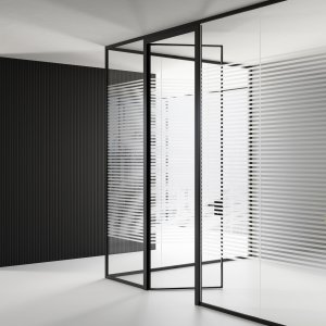 Mood glass partition walls by Las Mobili dividing a bright open-plan office