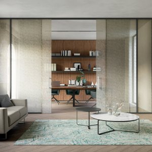 Meeting room enclosed by Quadrifoglio glass partitions