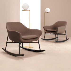 Manta armchair with headrest on four black tubular steel legs