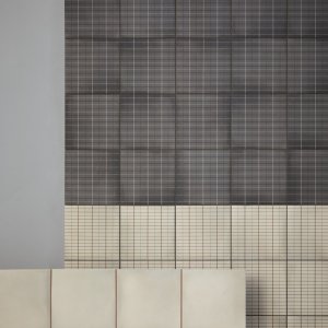 Tone on tone pairing of Aurore Light Blue solid and Grid L