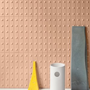 Punto Up Glossy Brun, brown crackle-glaze listel by Mutina