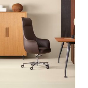 Leggera base with castors under a low-back Not Guilty armchair