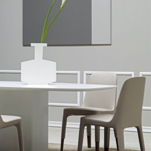 Silver polypropylene glide under an Ester chair leg