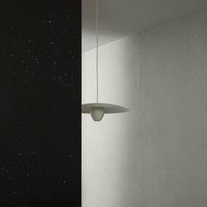 Primavera Nero sample tile with light chips